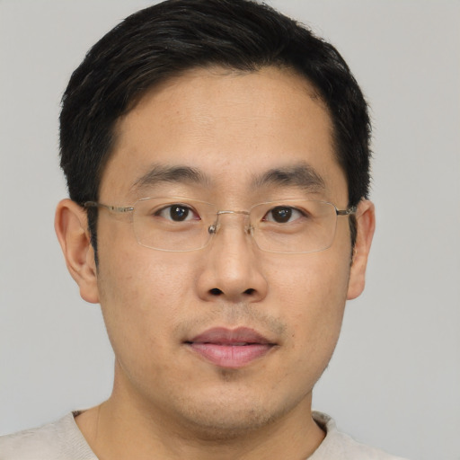 Neutral asian young-adult male with short  brown hair and brown eyes