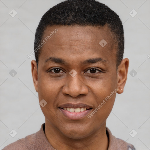 Joyful black young-adult male with short  brown hair and brown eyes