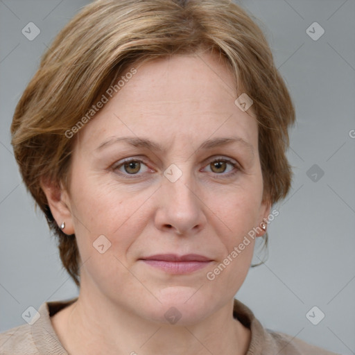 Joyful white adult female with medium  brown hair and blue eyes