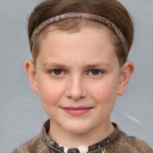 Joyful white child female with short  brown hair and grey eyes