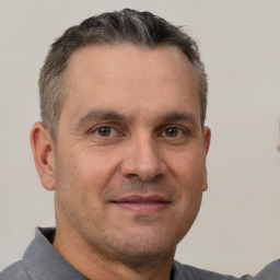 Neutral white adult male with short  brown hair and brown eyes