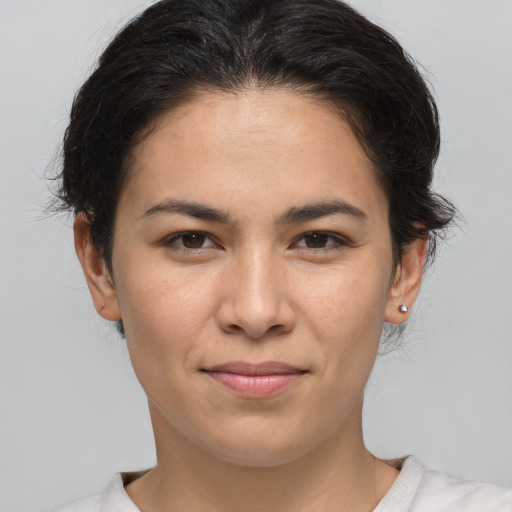 Joyful white young-adult female with medium  brown hair and brown eyes