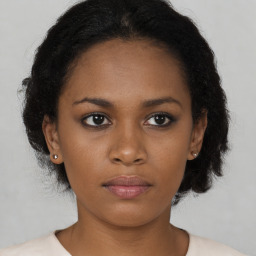 Neutral black young-adult female with short  black hair and brown eyes