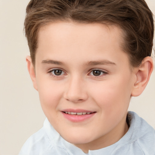 Joyful white child female with short  brown hair and brown eyes