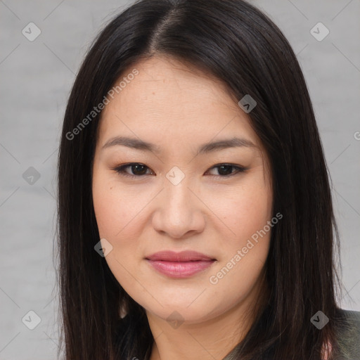 Joyful asian young-adult female with long  brown hair and brown eyes