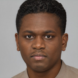 Neutral black young-adult male with short  brown hair and brown eyes