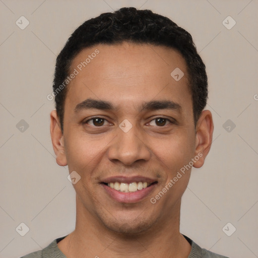 Joyful white young-adult male with short  black hair and brown eyes