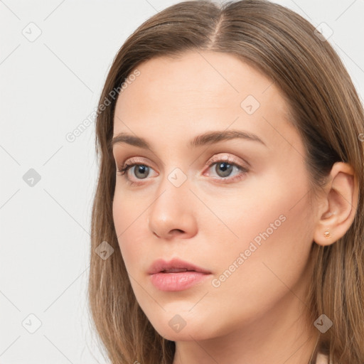 Neutral white young-adult female with long  brown hair and grey eyes