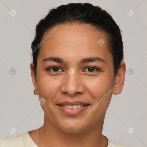 Joyful latino young-adult female with short  brown hair and brown eyes