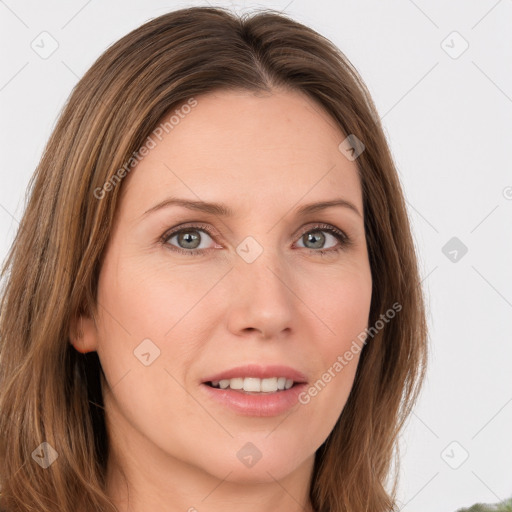 Joyful white young-adult female with long  brown hair and green eyes