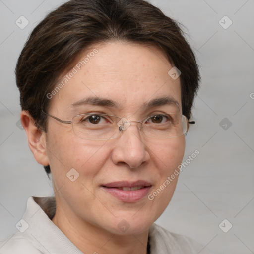 Joyful white adult female with short  brown hair and brown eyes