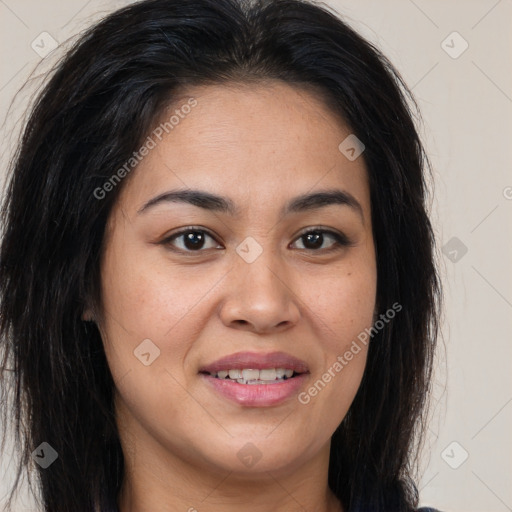 Joyful latino young-adult female with long  brown hair and brown eyes