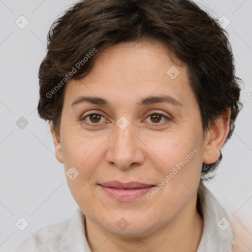 Joyful white adult female with short  brown hair and brown eyes