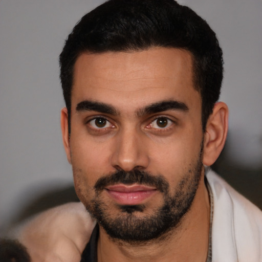 Neutral latino young-adult male with short  black hair and brown eyes