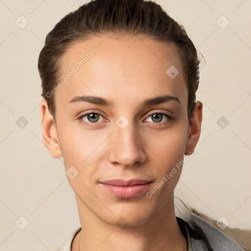 Joyful white young-adult female with short  brown hair and brown eyes