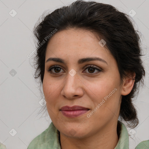 Joyful white adult female with medium  brown hair and brown eyes