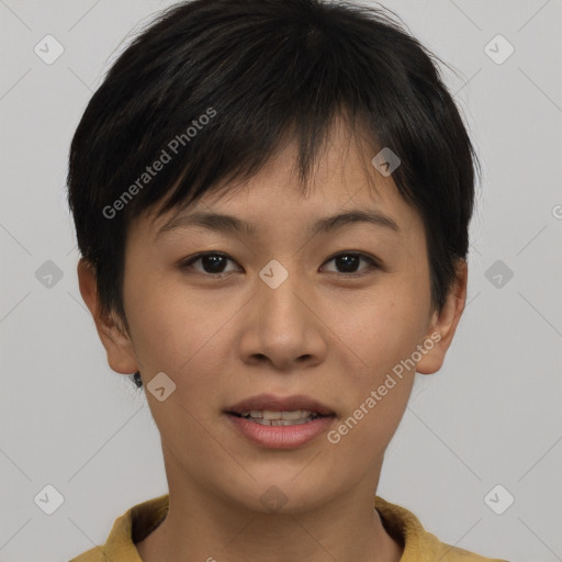 Joyful asian young-adult female with short  brown hair and brown eyes