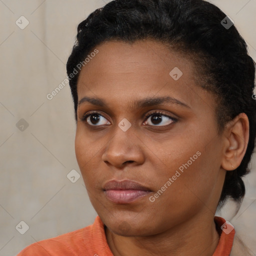 Neutral black young-adult female with short  black hair and brown eyes