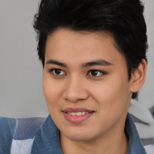 Joyful asian young-adult female with short  black hair and brown eyes