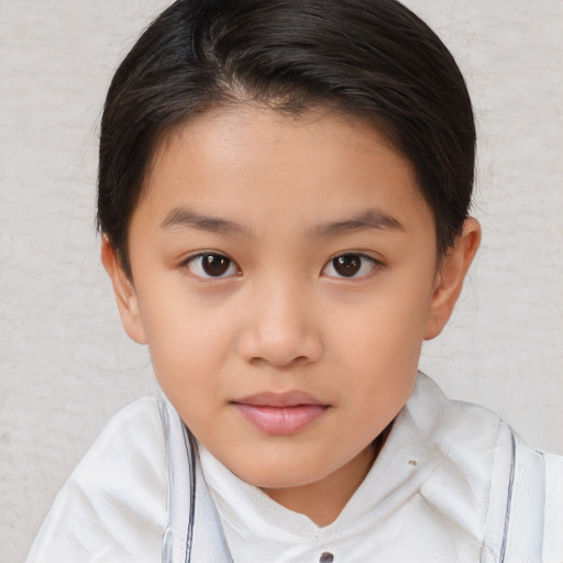 Joyful white child female with medium  brown hair and brown eyes