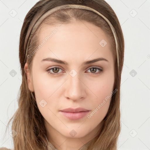 Neutral white young-adult female with long  brown hair and brown eyes