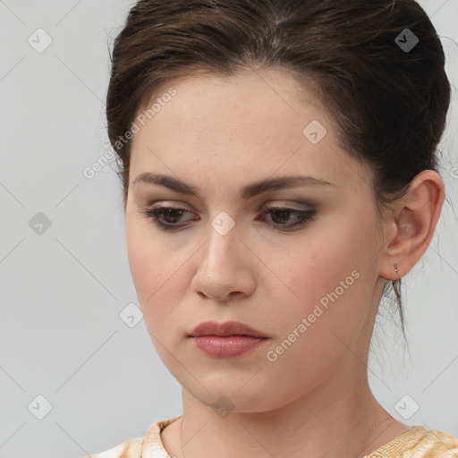 Neutral white young-adult female with medium  brown hair and brown eyes