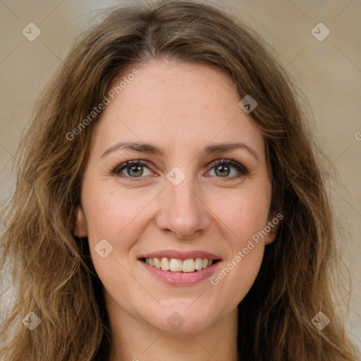 Joyful white young-adult female with long  brown hair and green eyes