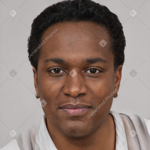 Joyful black young-adult male with short  black hair and brown eyes