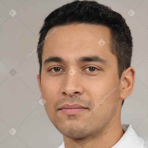 Neutral latino young-adult male with short  black hair and brown eyes