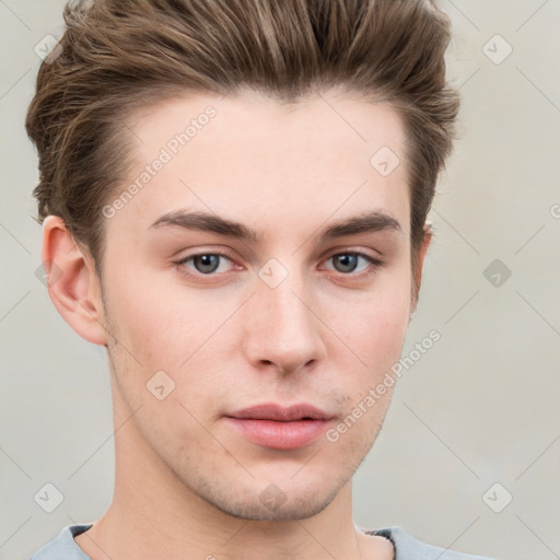 Neutral white young-adult male with short  brown hair and grey eyes