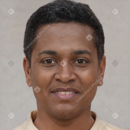 Joyful latino young-adult male with short  brown hair and brown eyes