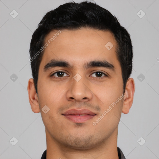 Joyful asian young-adult male with short  black hair and brown eyes