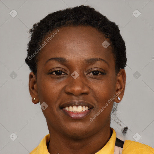 Joyful black young-adult female with short  brown hair and brown eyes