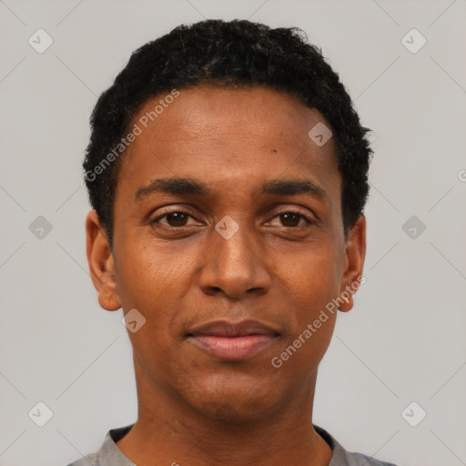 Neutral black young-adult male with short  black hair and brown eyes