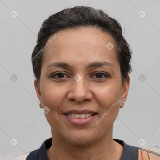 Joyful white adult female with short  brown hair and brown eyes