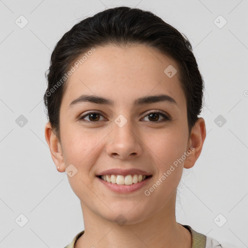 Joyful white young-adult female with short  brown hair and brown eyes