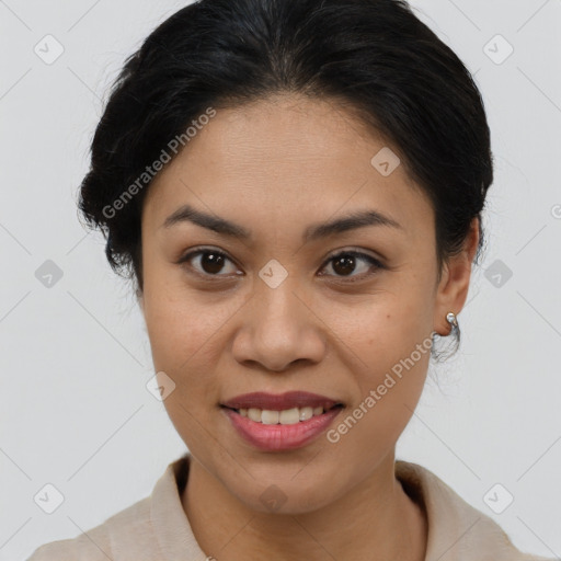 Joyful latino young-adult female with short  brown hair and brown eyes