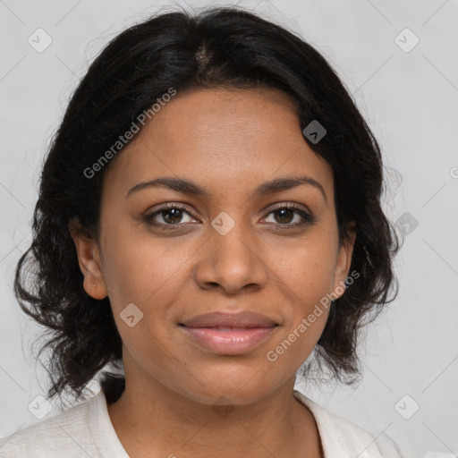 Joyful black young-adult female with medium  brown hair and brown eyes