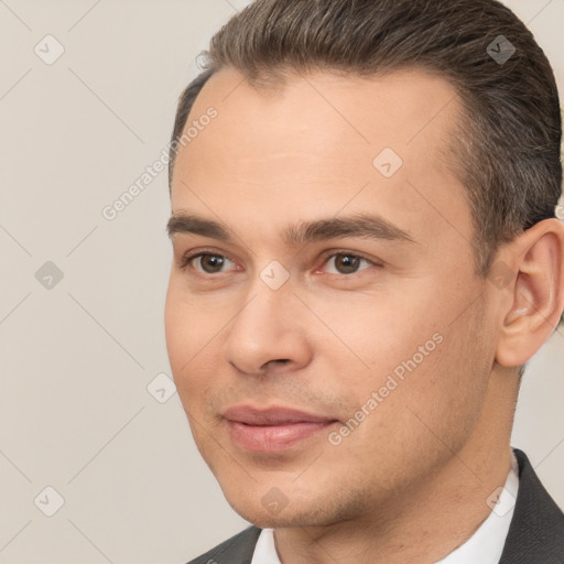 Joyful white young-adult male with short  brown hair and brown eyes