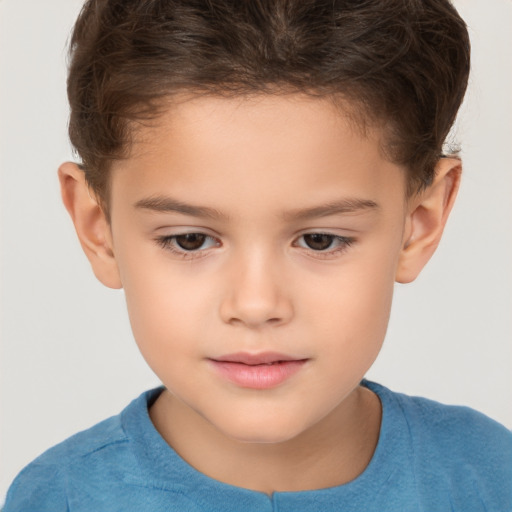 Joyful white child female with short  brown hair and brown eyes