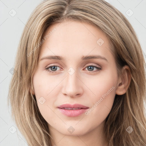 Joyful white young-adult female with long  brown hair and green eyes