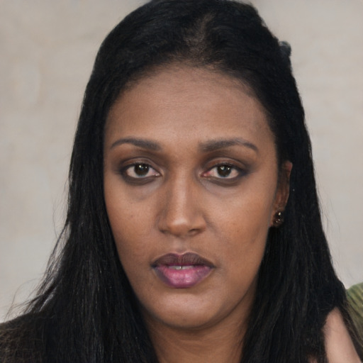 Neutral latino young-adult female with long  black hair and brown eyes