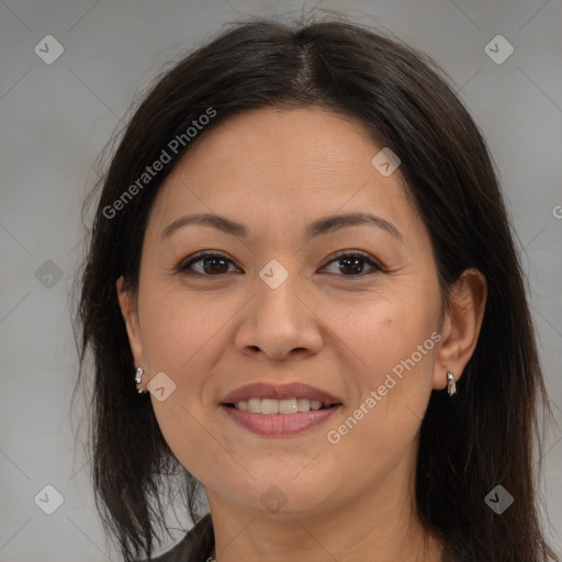 Joyful white adult female with medium  brown hair and brown eyes