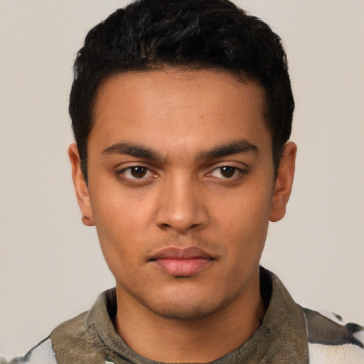 Neutral latino young-adult male with short  black hair and brown eyes