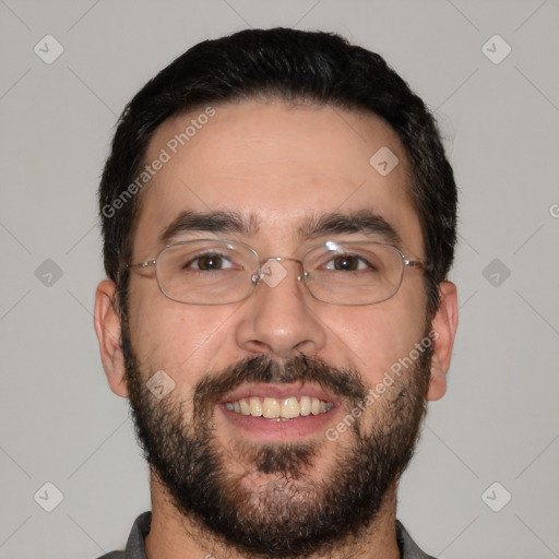 Joyful white adult male with short  black hair and brown eyes