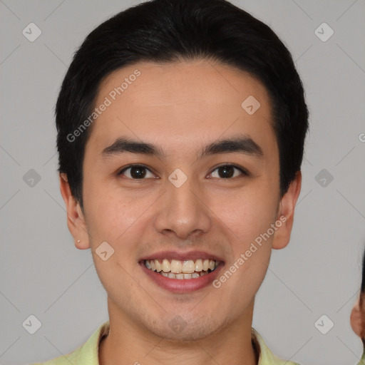 Joyful white young-adult male with short  black hair and brown eyes