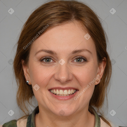 Joyful white adult female with medium  brown hair and brown eyes