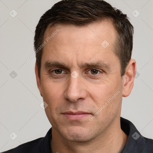 Neutral white adult male with short  brown hair and brown eyes