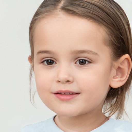 Joyful white child female with medium  brown hair and brown eyes