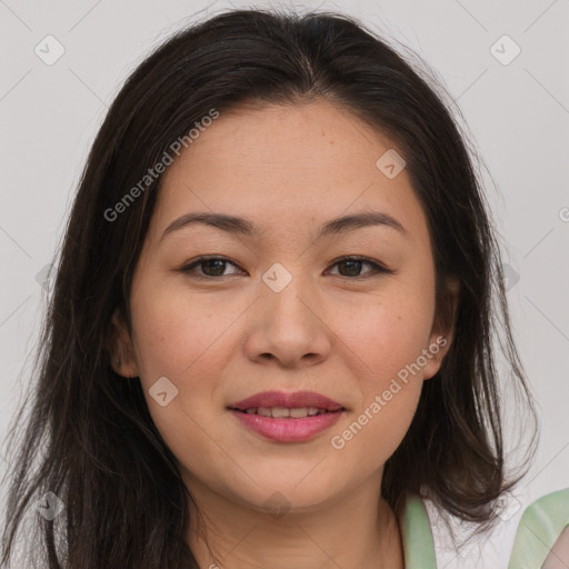 Joyful asian young-adult female with long  brown hair and brown eyes